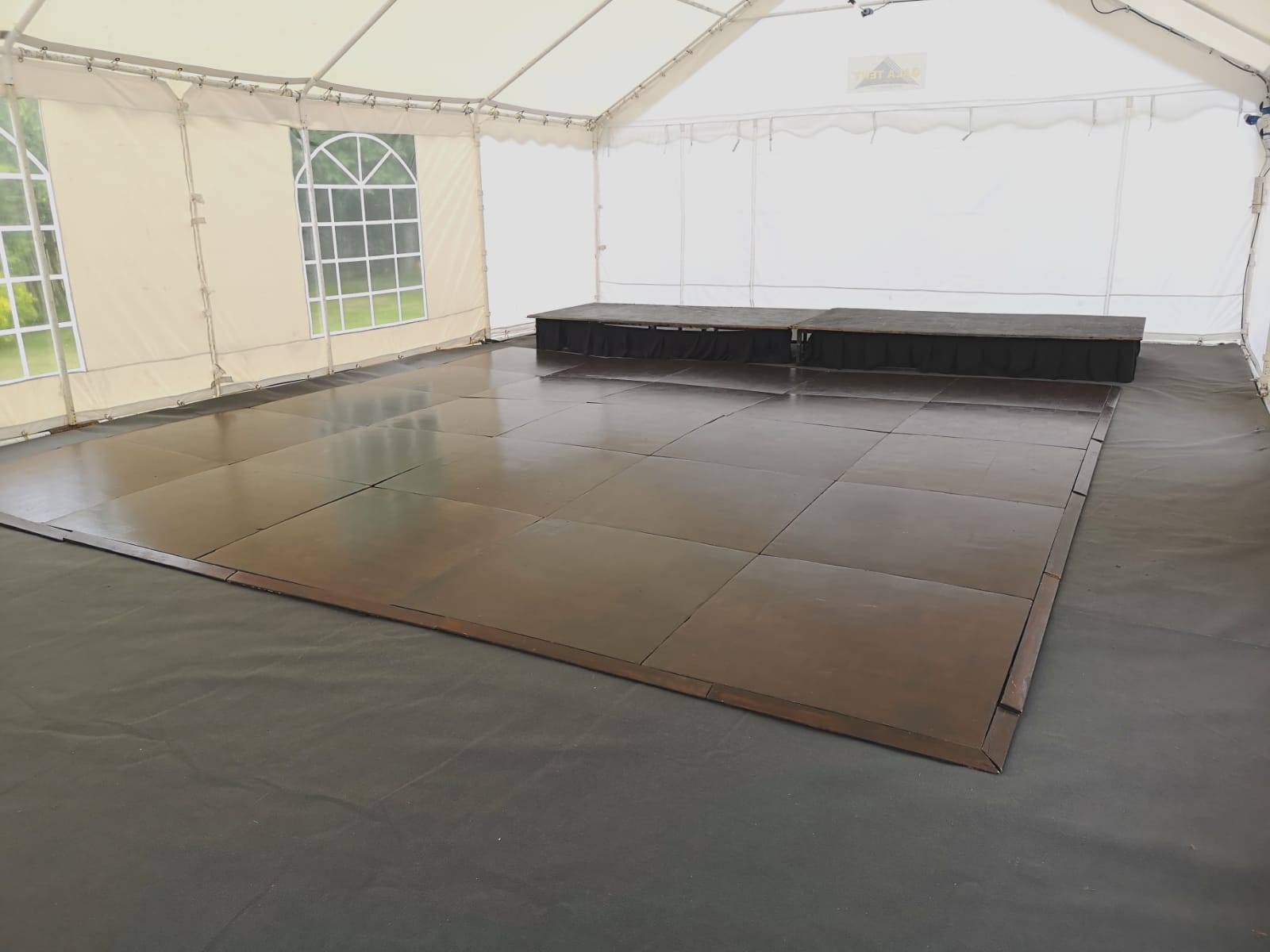 party tent with dance floor and stage