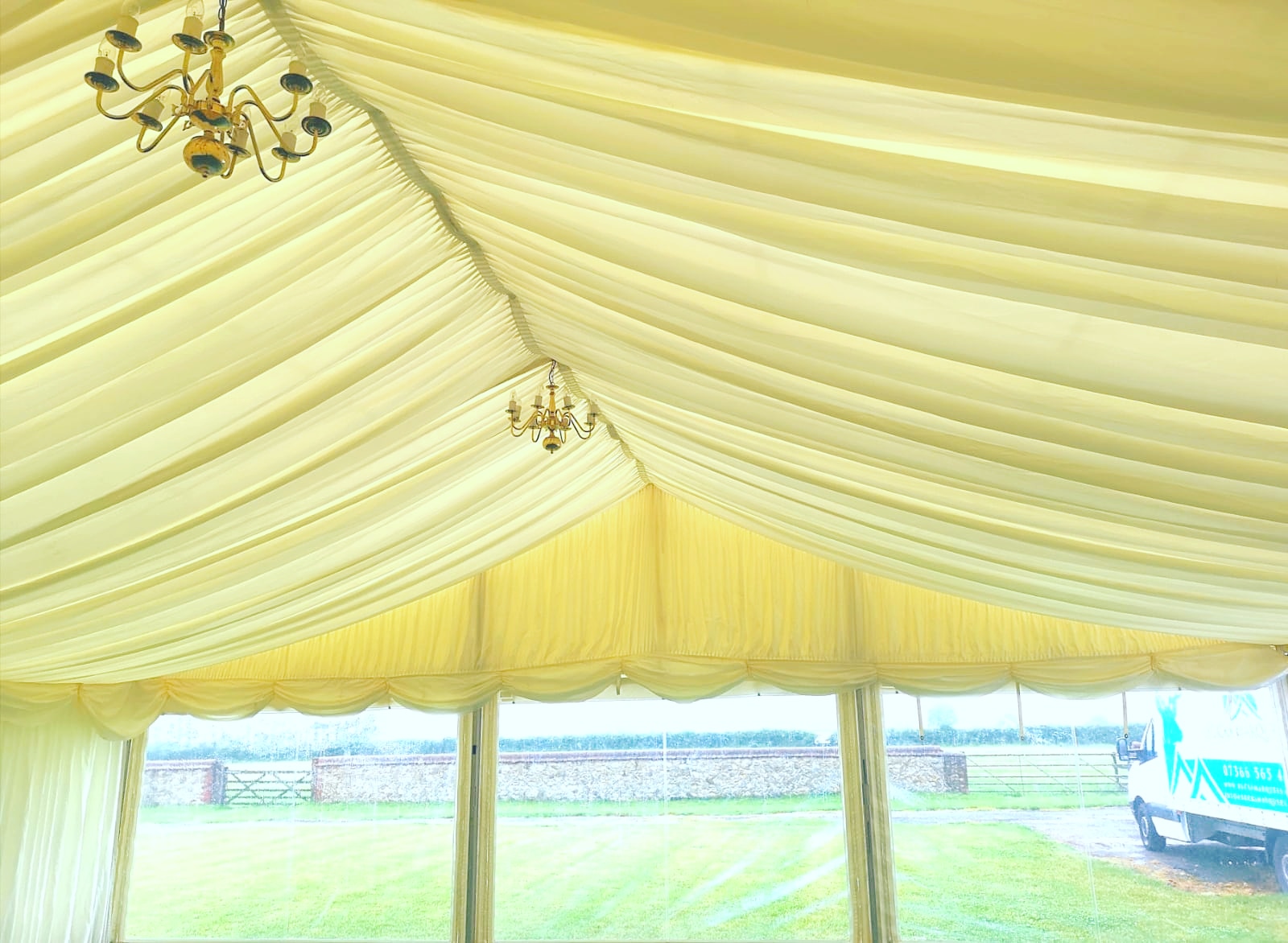 lined party tent with clear window panels